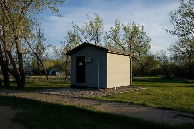 Small utility building in a village park